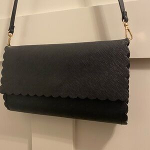 Black h&m purse with ruffle design